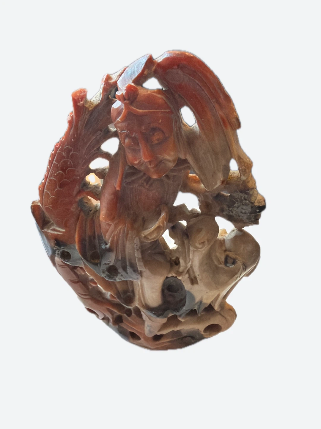 Carved Soapstone Figurine of a Person with Dragon - photo 3
