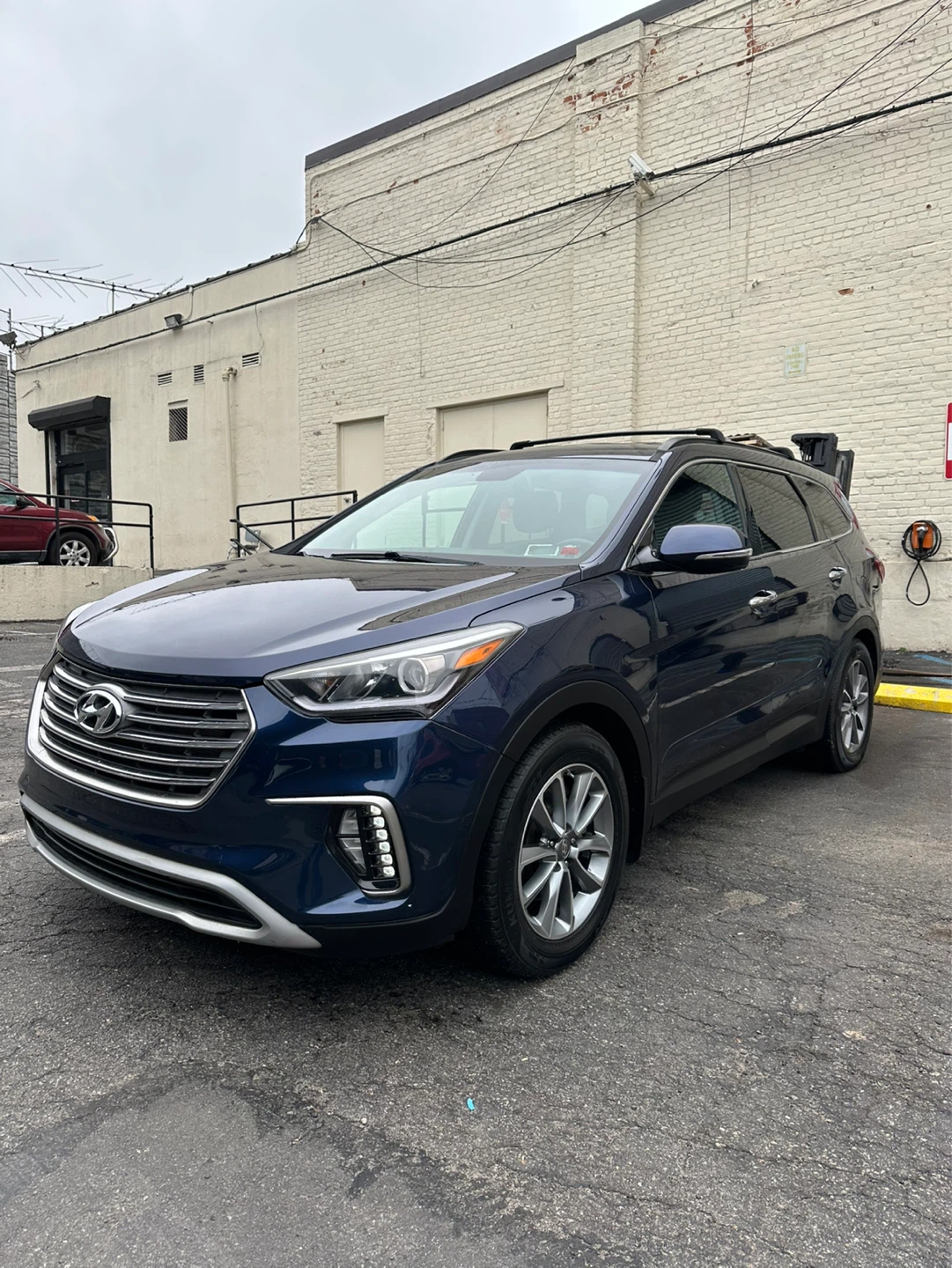 Blue Hyundai Santa Fe SUV - photo 2