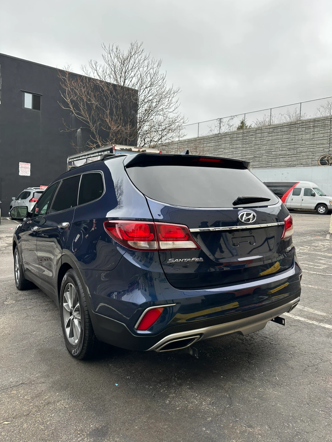 Blue Hyundai Santa Fe SUV - photo 3