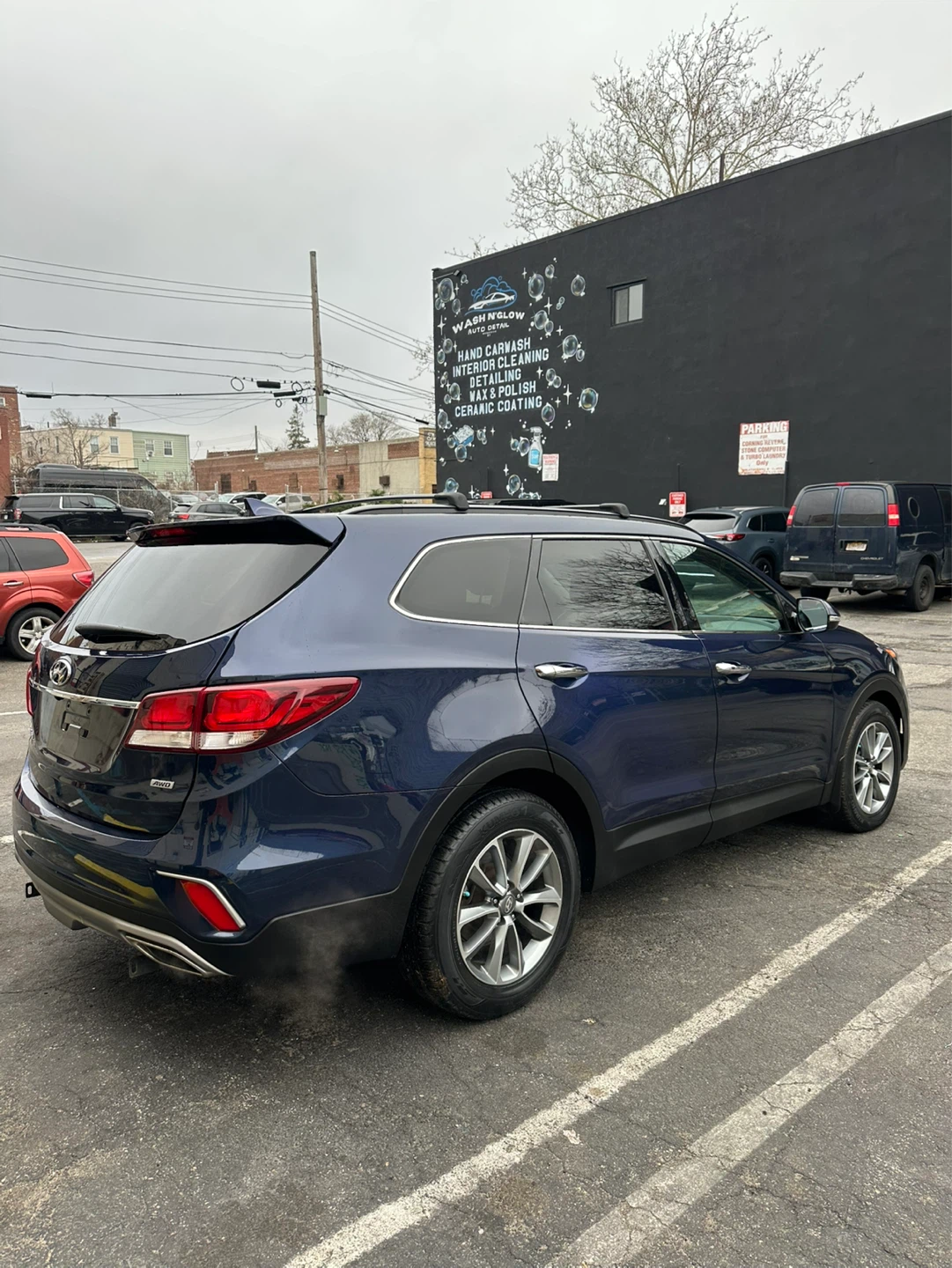 Blue Hyundai Santa Fe SUV - photo 4