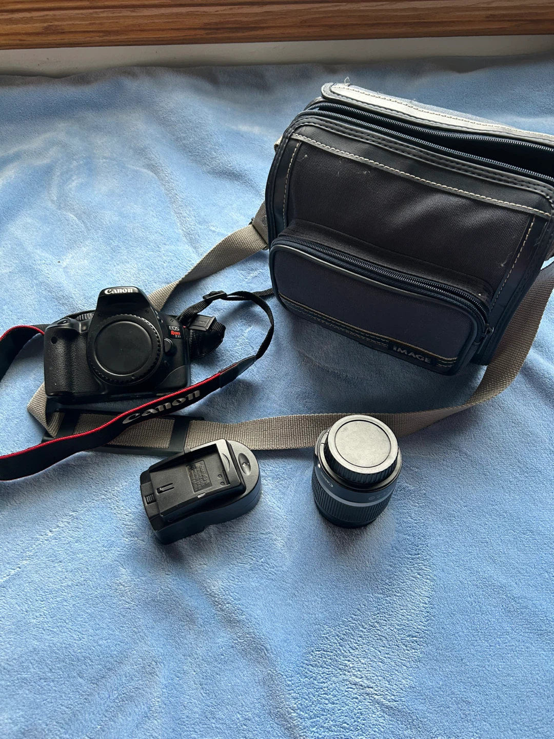 Canon EOS Rebel T2i DSLR Camera with 18-55mm Lens and Bag