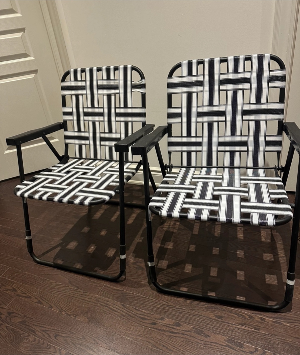 Pair of Black and White Striped Folding Camp Chairs