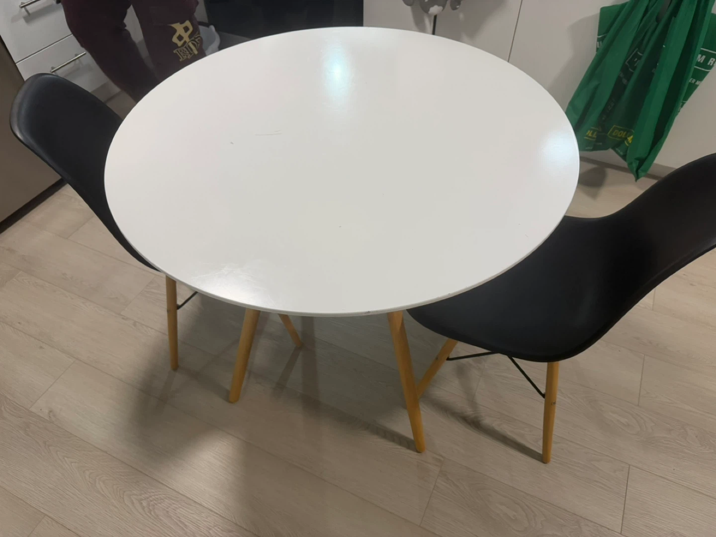 White Round Dining Table with 2 Black Chairs - photo 2