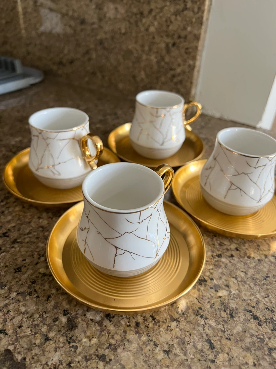 Set of 4 White and Gold Coffee Cups and Saucers