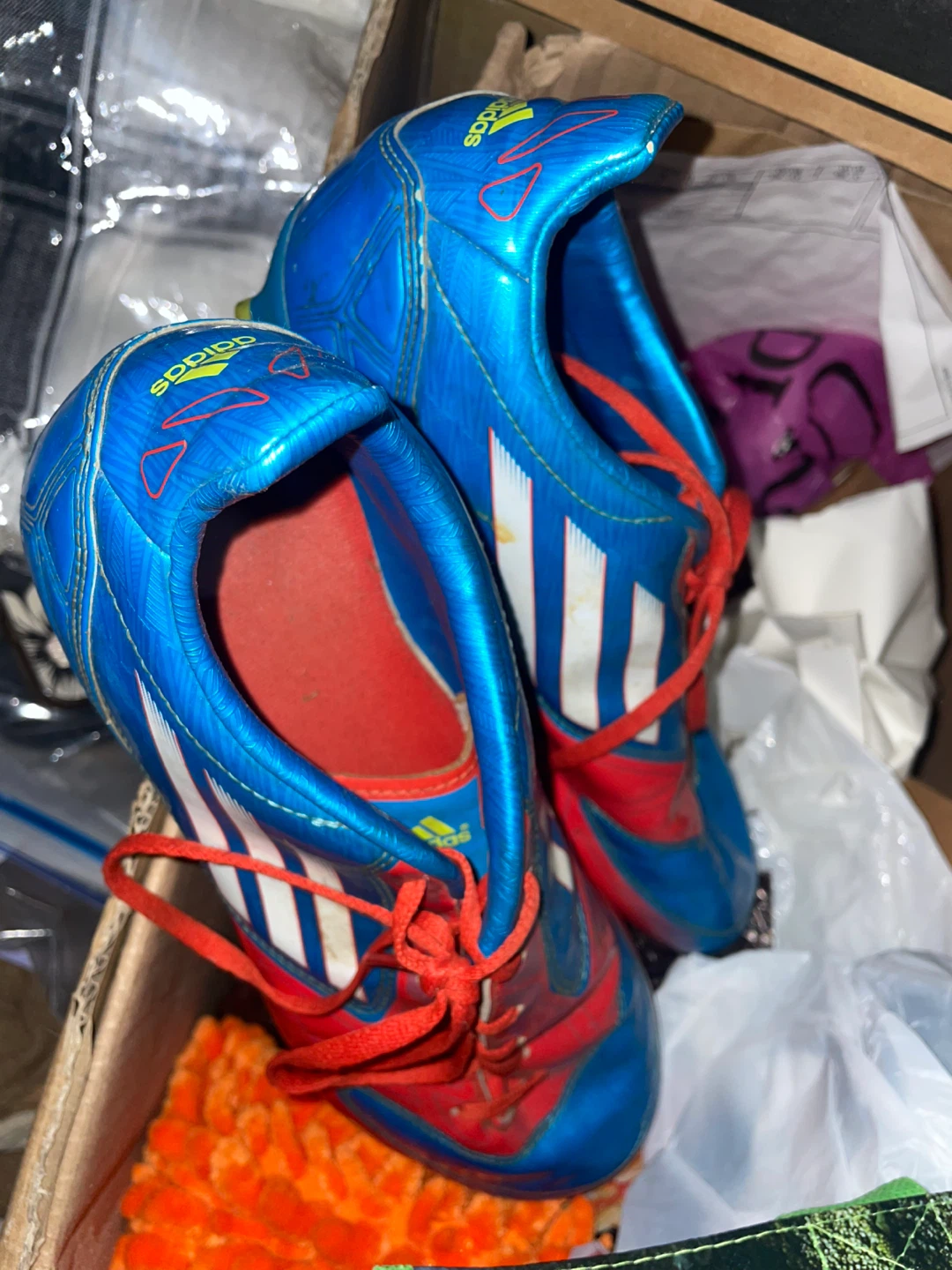 Adidas Blue and Red Soccer Cleats