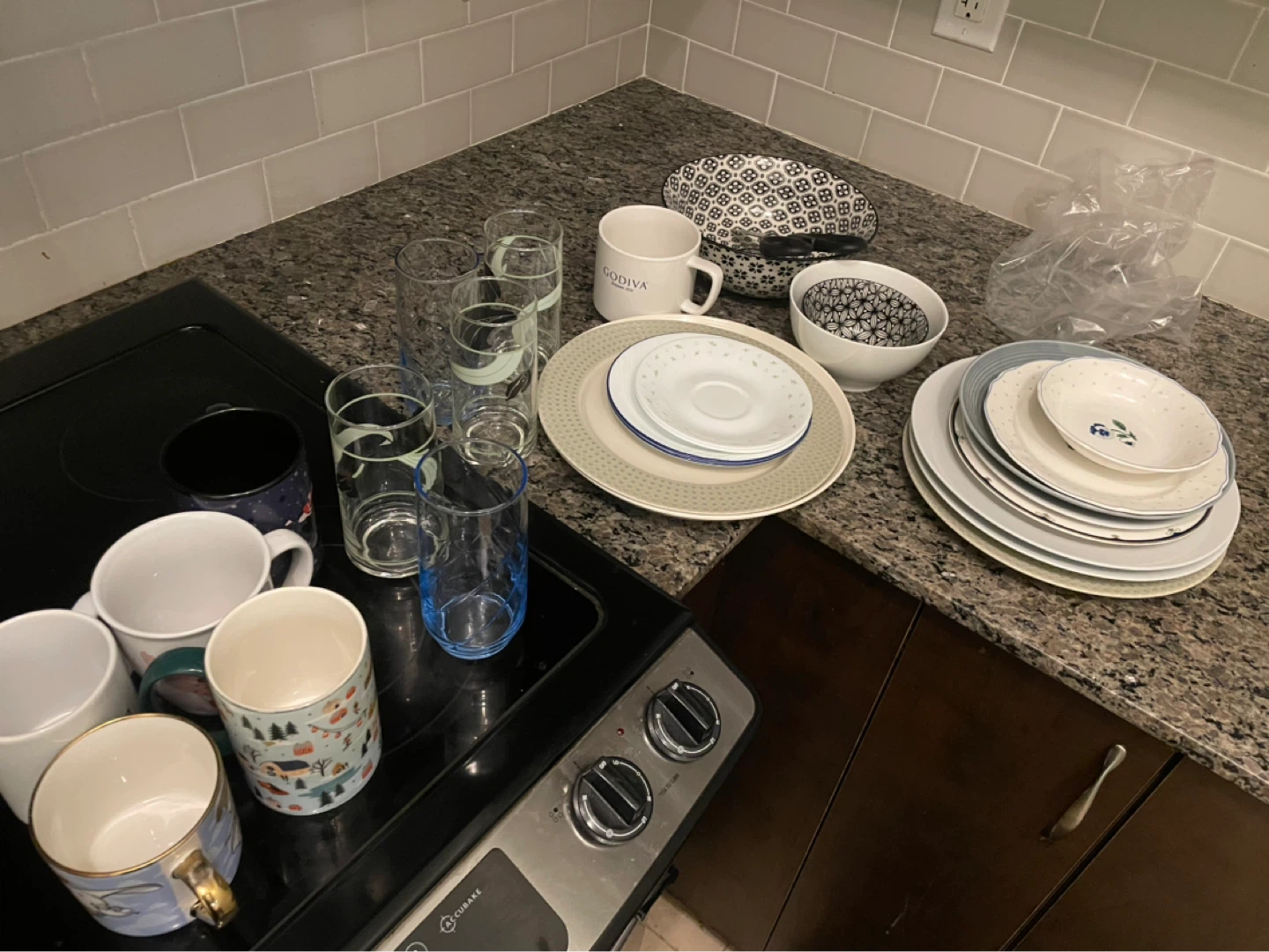 Assorted Mugs, Glasses, and Plates