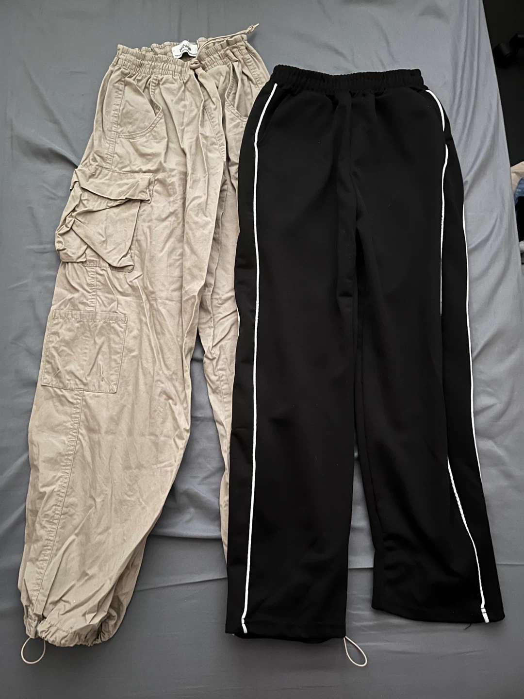 Parachute pants and black wide-legged sweatpants