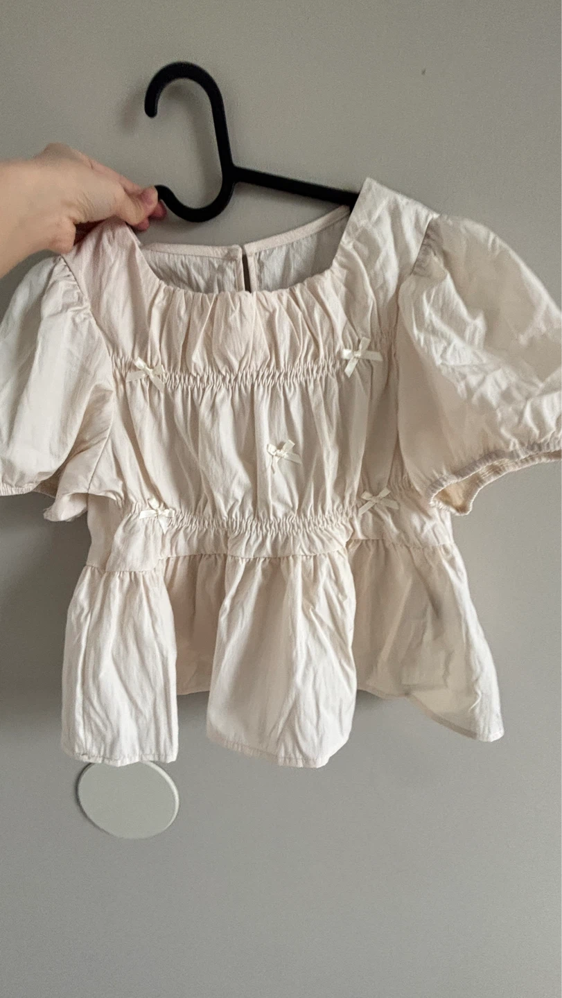 Cream Peplum Blouse with Bows