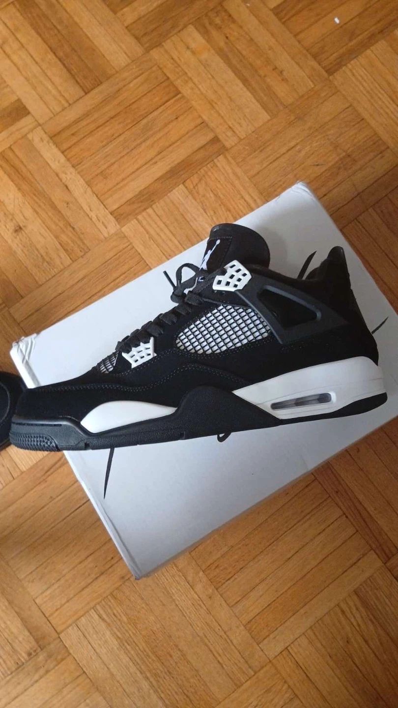 Air Jordan 4 Retro Black White Sneakers - photo 3