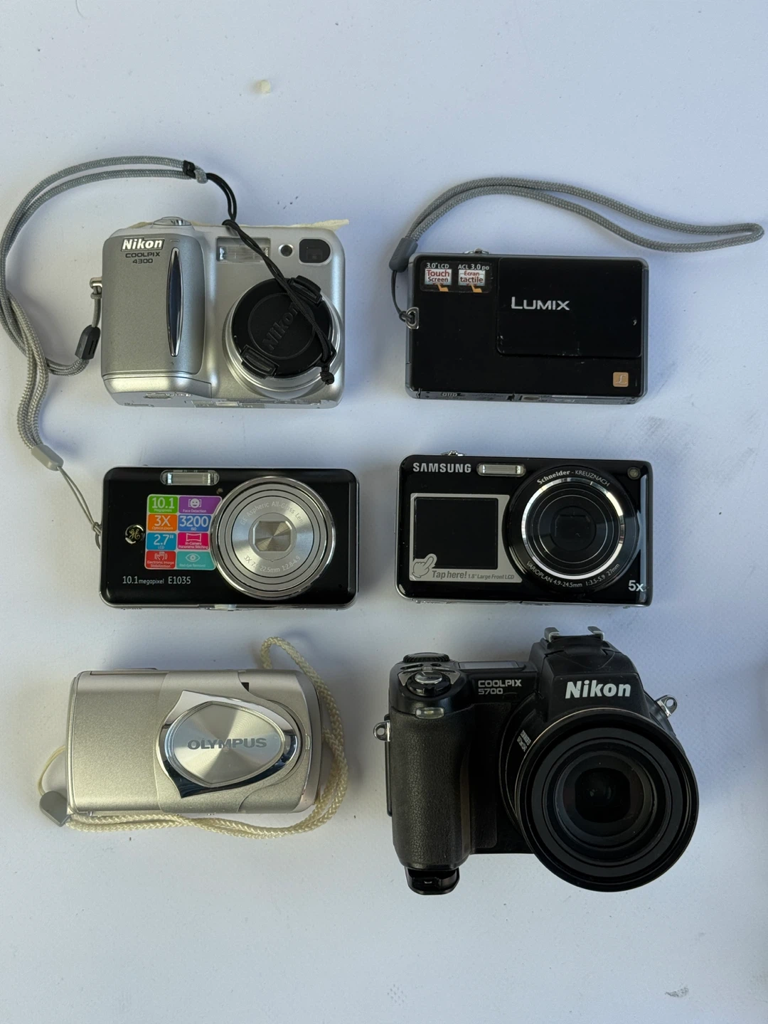 Bundle of 5 Digital Cameras - Nikon, Lumix, Samsung, Olympus