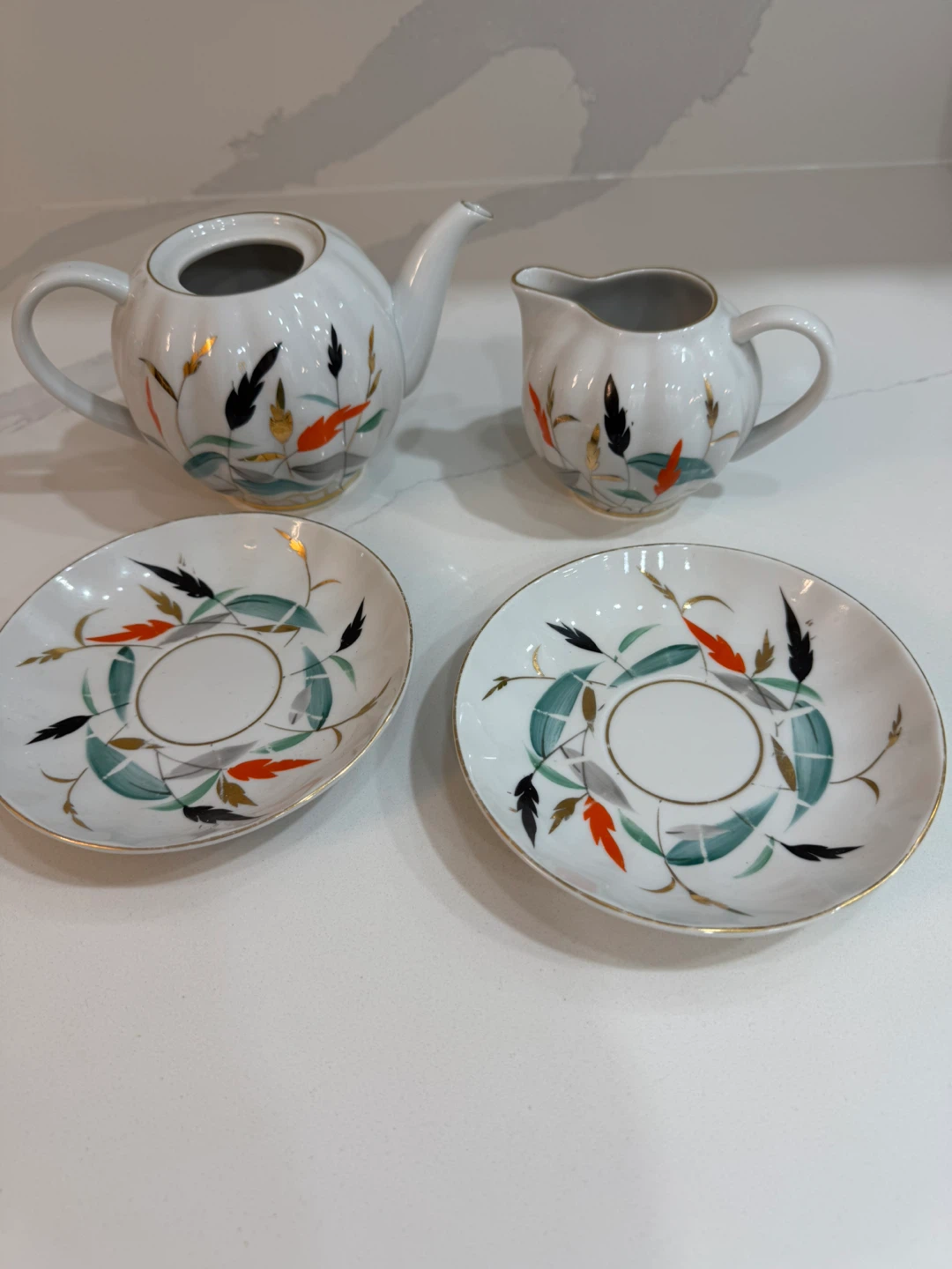 Vintage Tea Set with Creamer and 2 Saucers