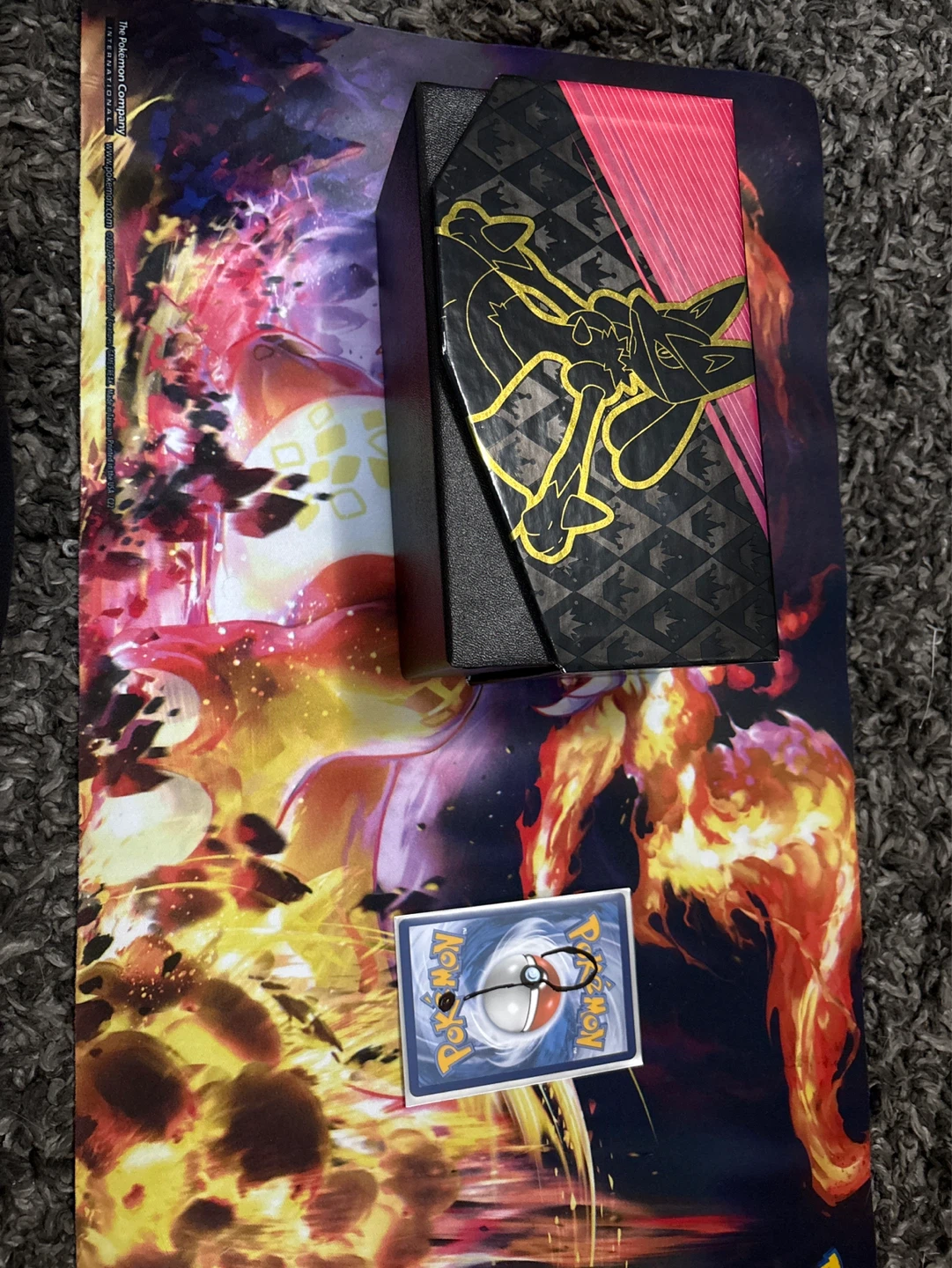 Pokémon storage box with cards in it and mystery card?