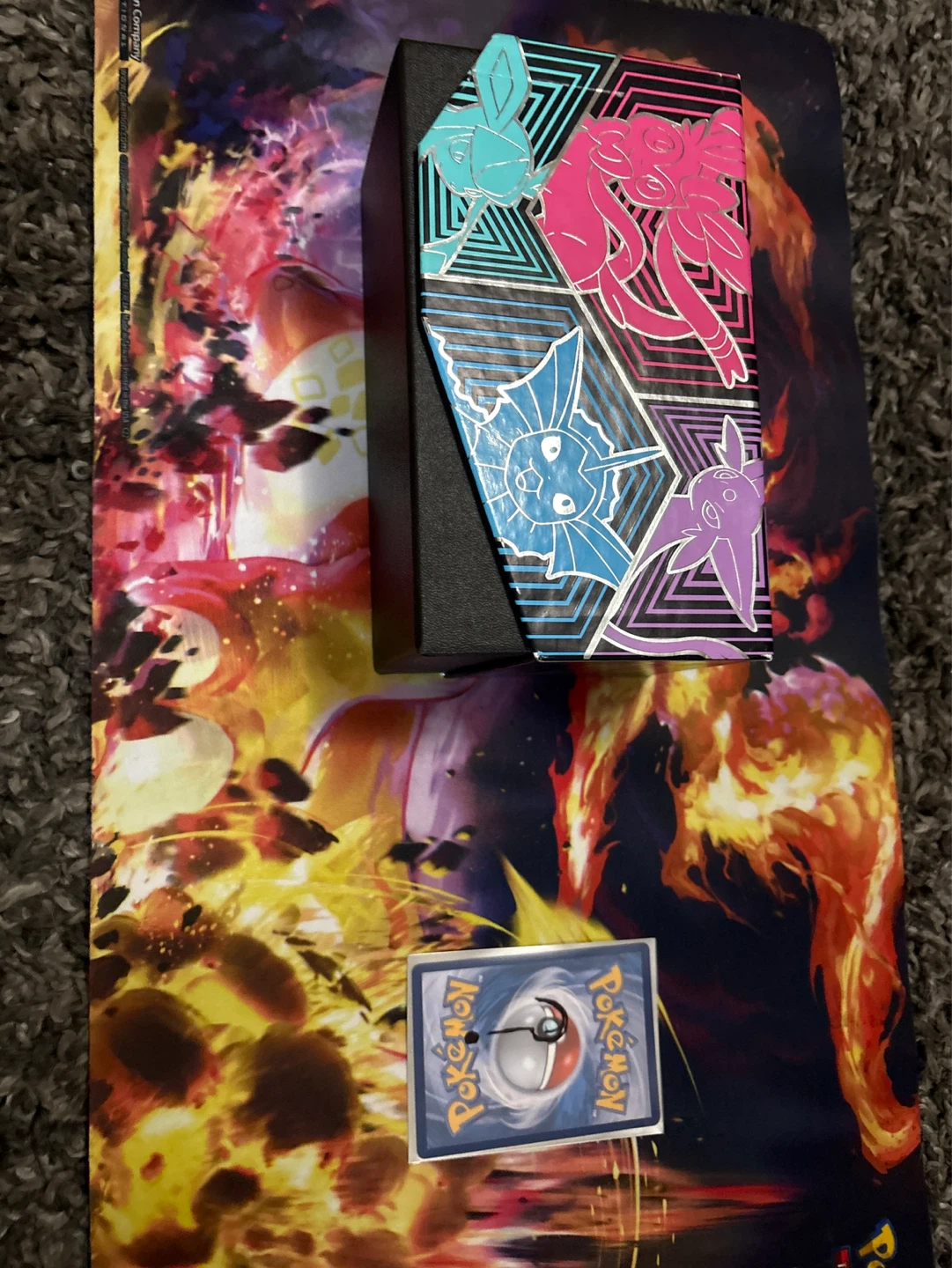 Pokémon storage box with cards in it and mystery card?