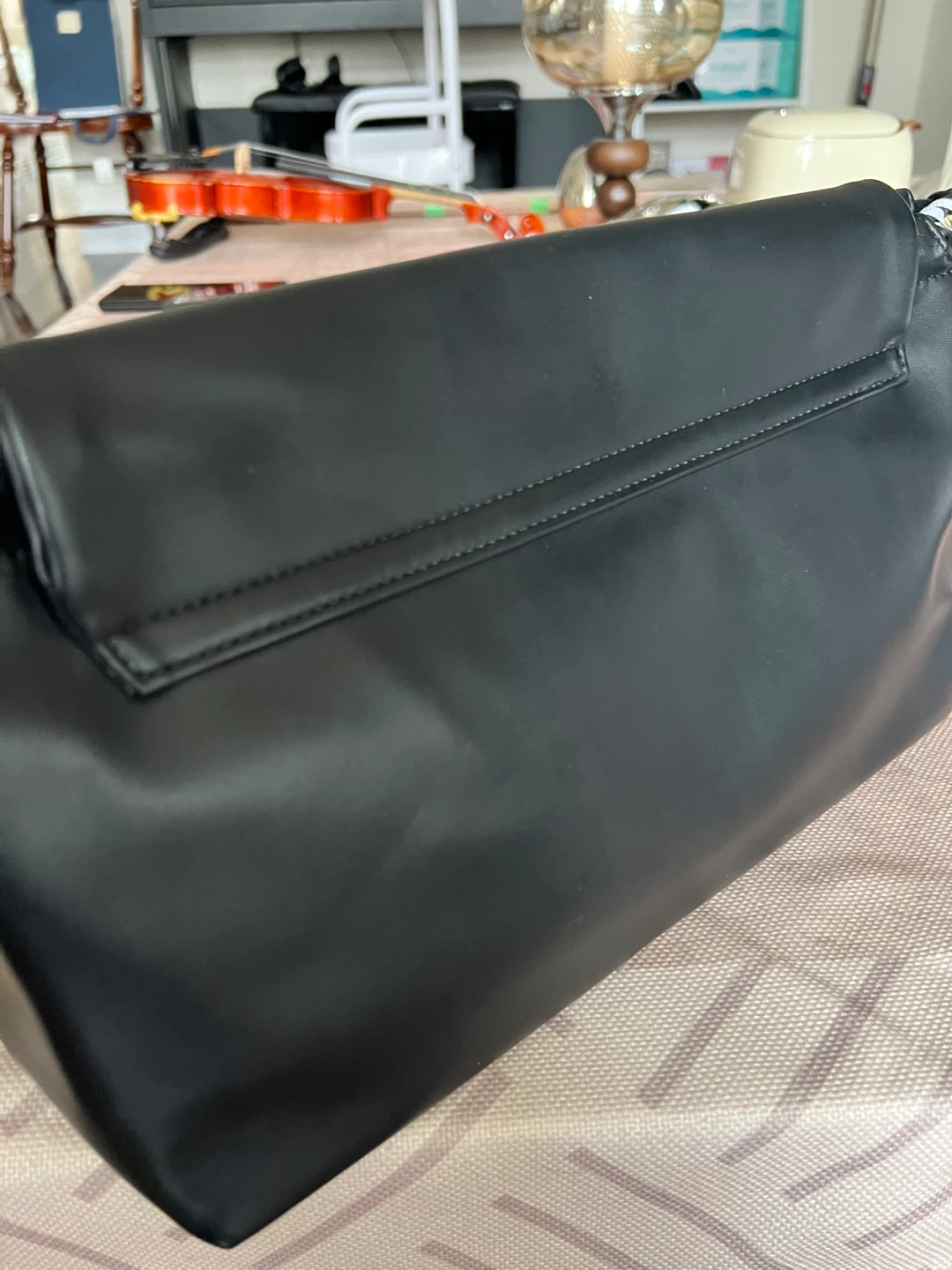 Black Leather Clutch Bag with Gold 'V' Clasp - photo 2