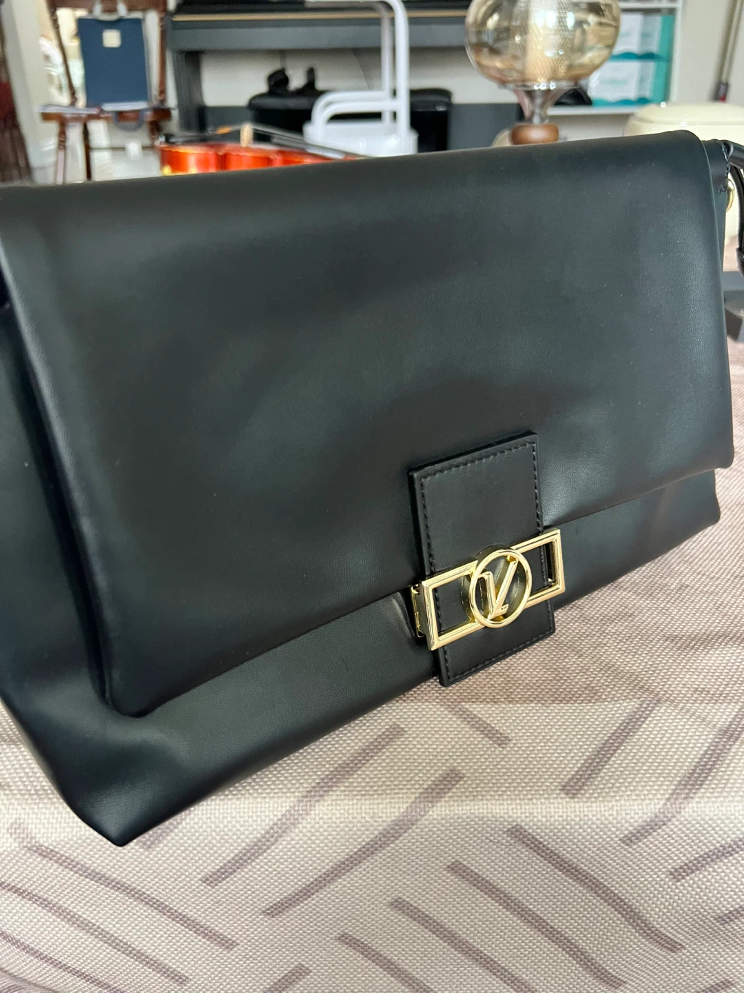 Black Leather Clutch Bag with Gold 'V' Clasp