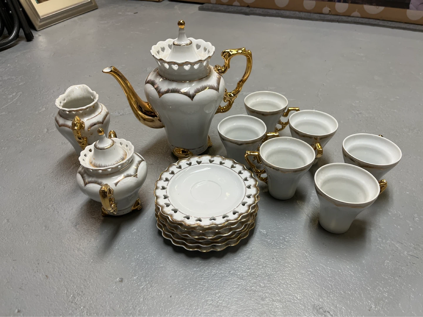 White and Gold Teacup and Saucer Set