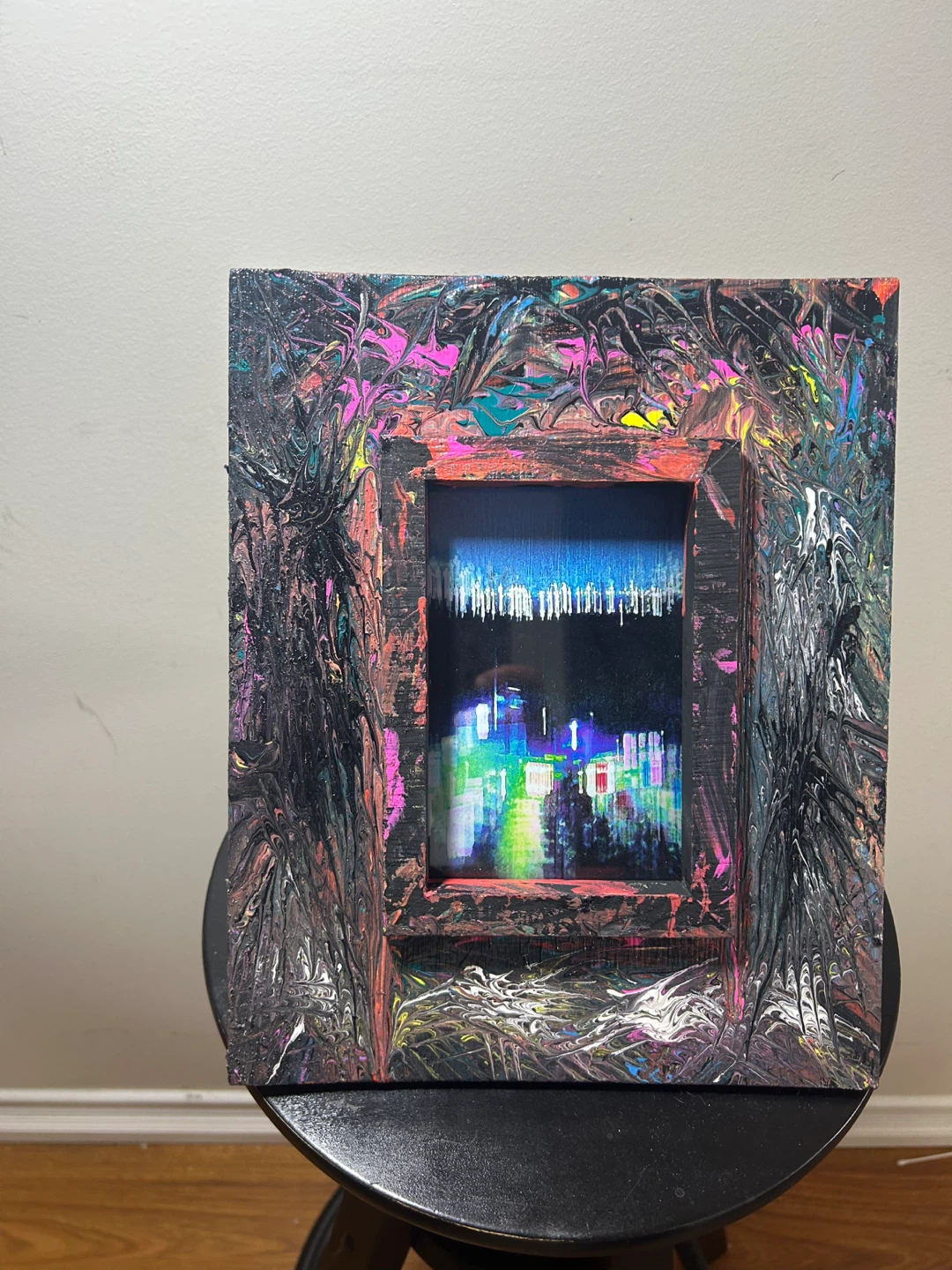 Abstract Art Piece with Cityscape Reflection