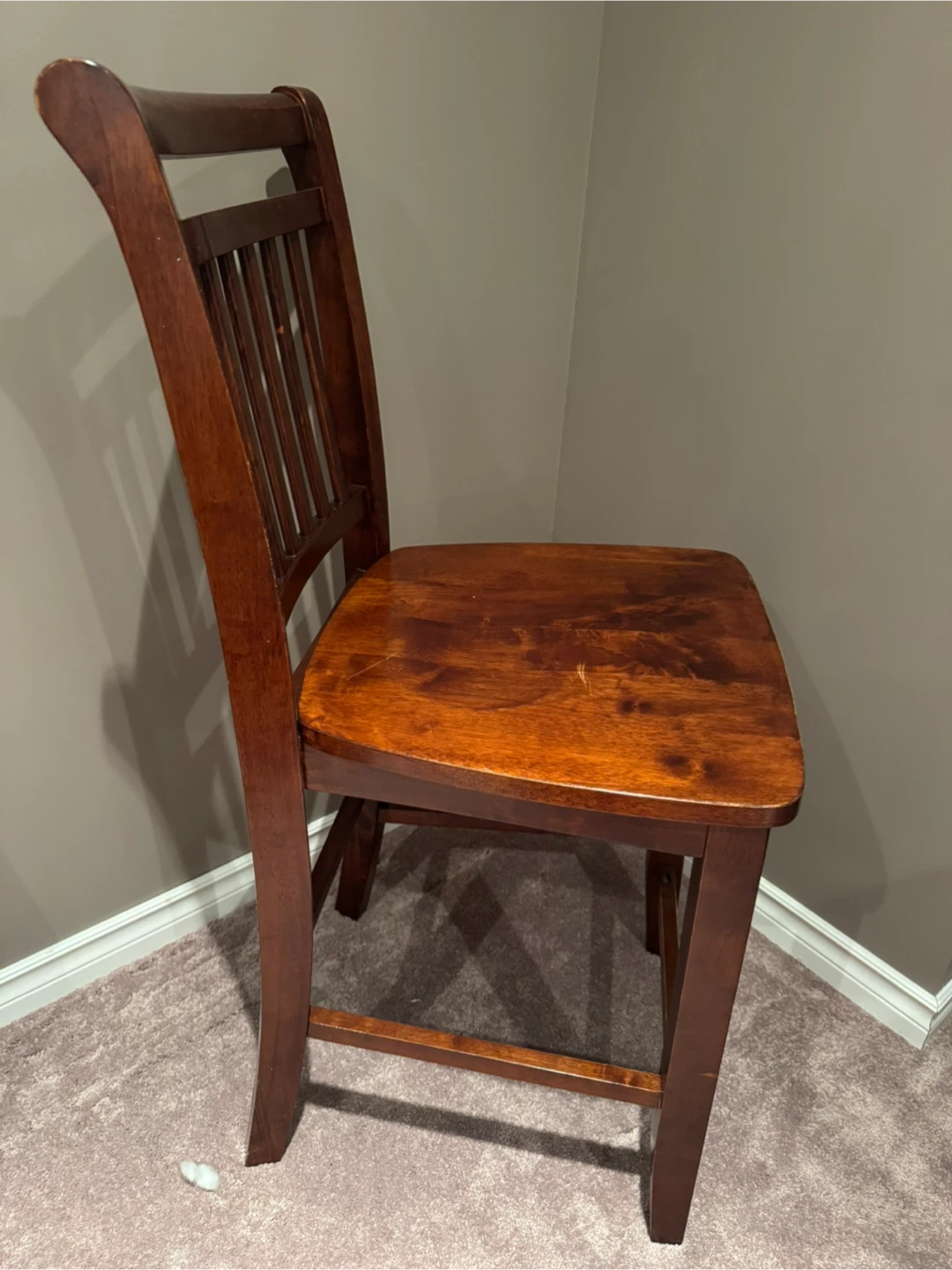 Two Wooden Counter height solid wooden chairs