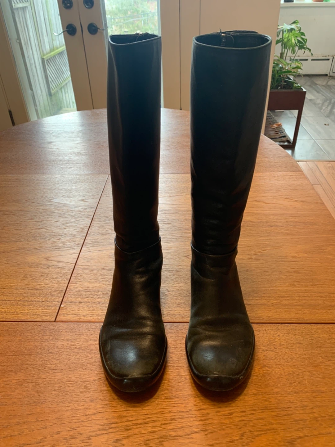 Black Leather Knee-High Prada Boots