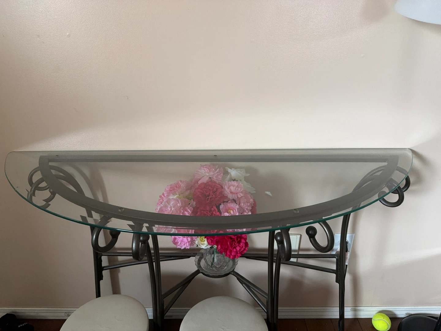 Glass top console table with metal base