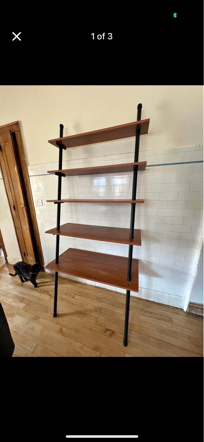 Leaning book shelf comes apart in 2 pieces