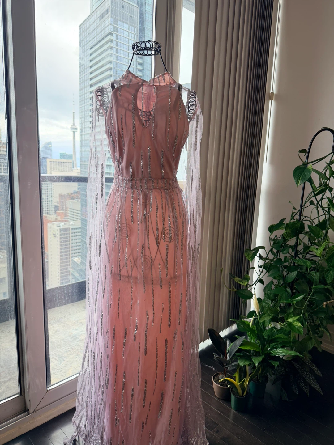 Pink sequined gown with sheer overlay
