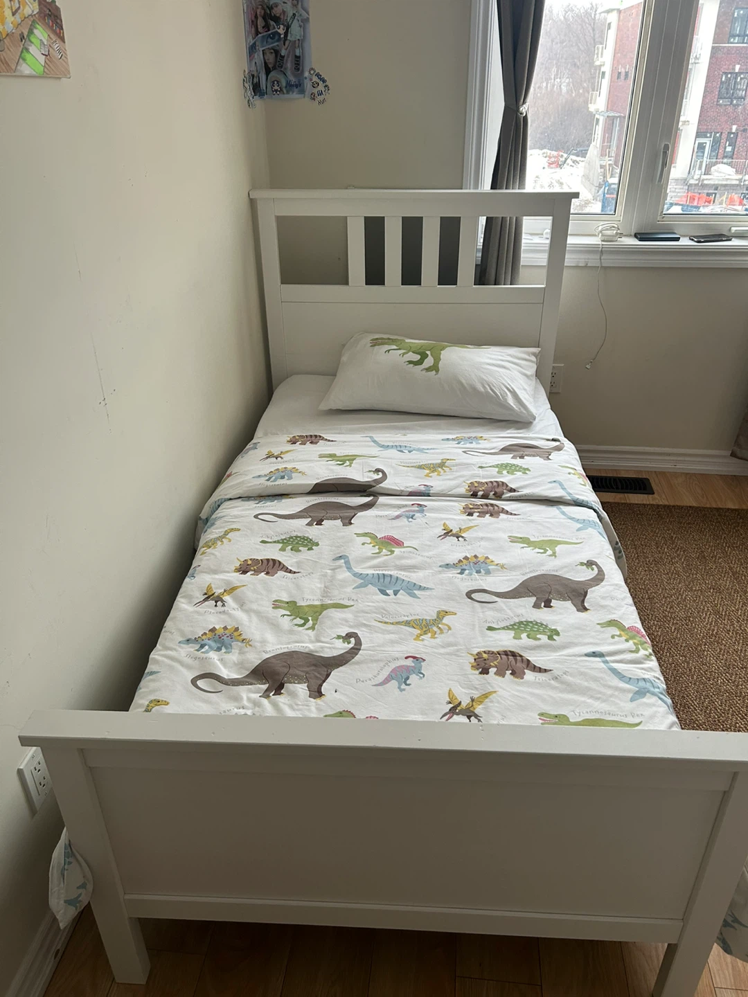IKEA - White Twin Bed Frame with Dinosaur Bedding