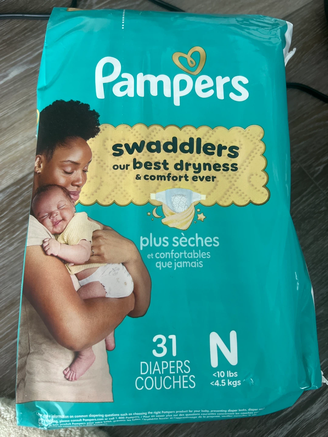 Pampers Diapers - Size N (31 count) and pamper wet paper