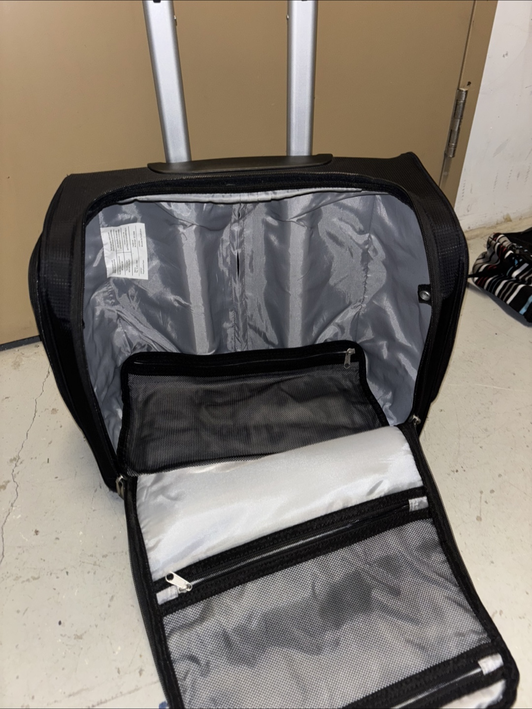 Black Delsey Rolling Carry-On Luggage Bag