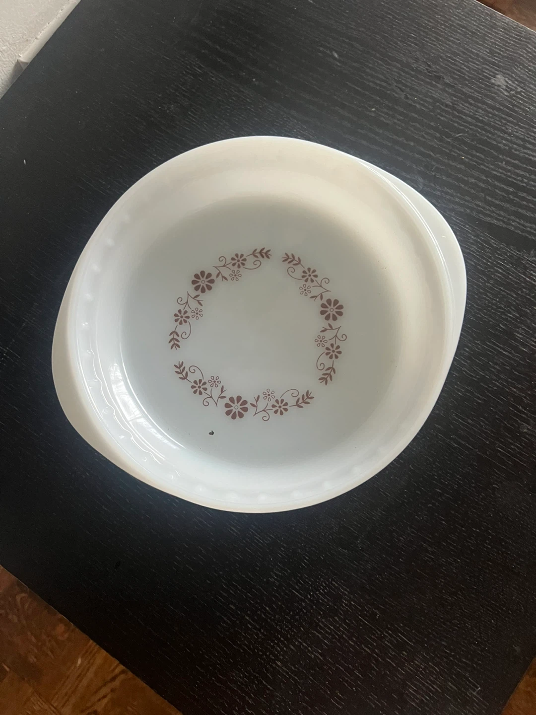 Pyrex white casserole dish with floral design