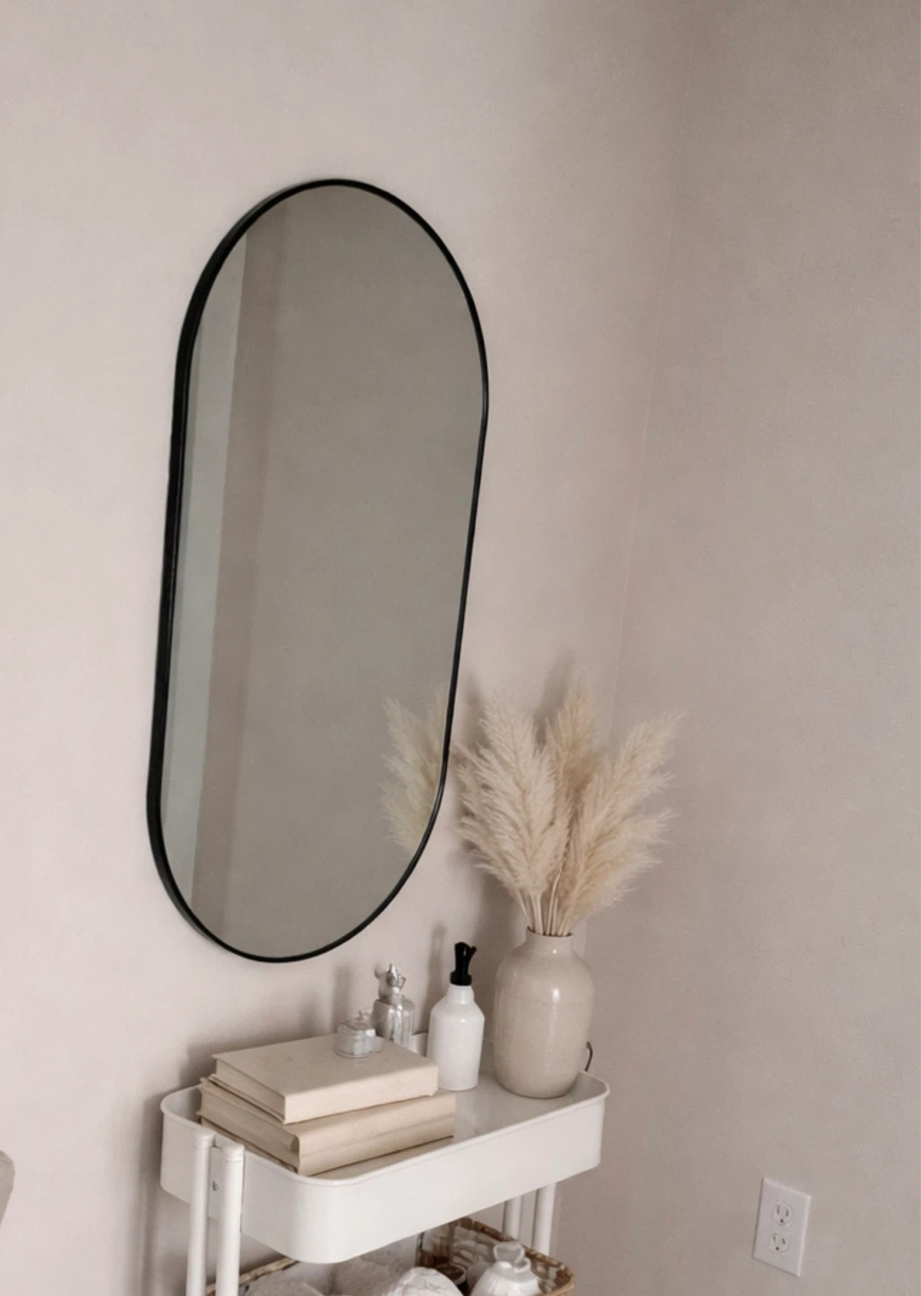 Oval Shaped Mirror with Black Frame