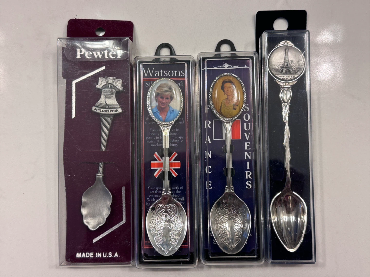 Collection of 4 Souvenir Spoons