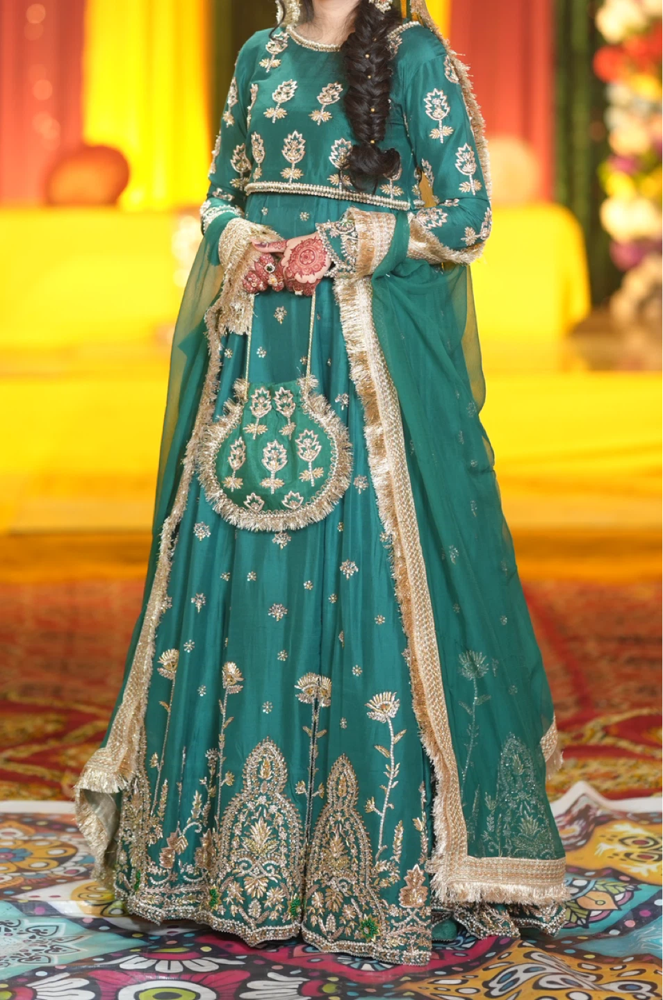 Green embroidered Lehnga Choli with dupatta and clutch