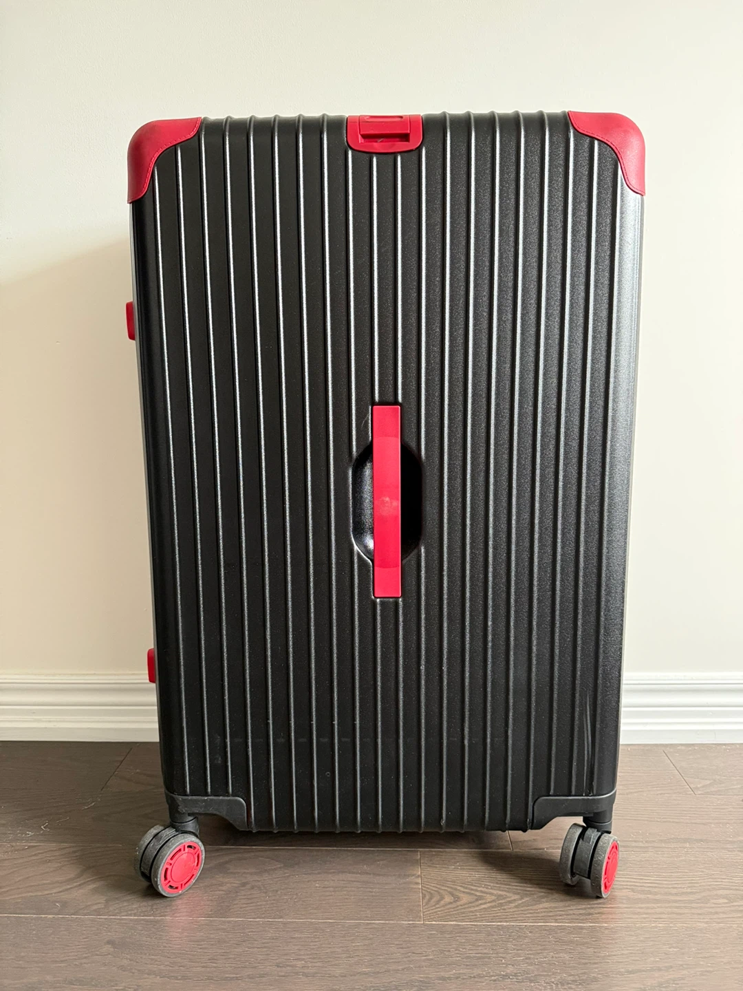Black Suitcase with Red Accents