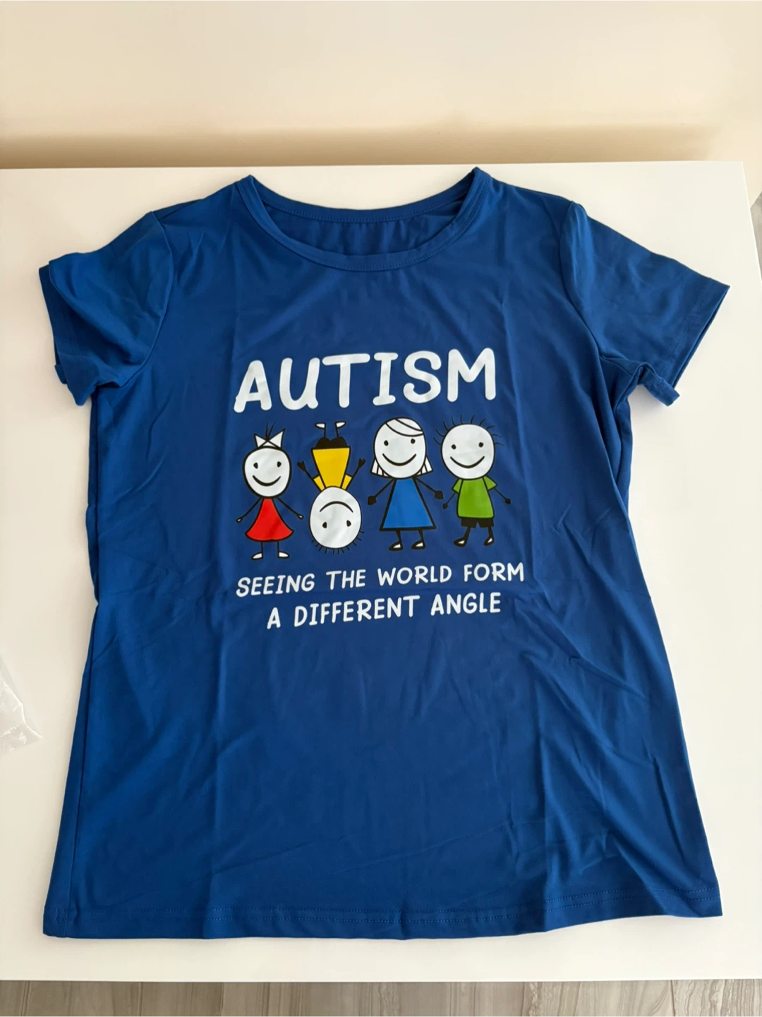 Blue T-shirt with Autism Awareness Graphic