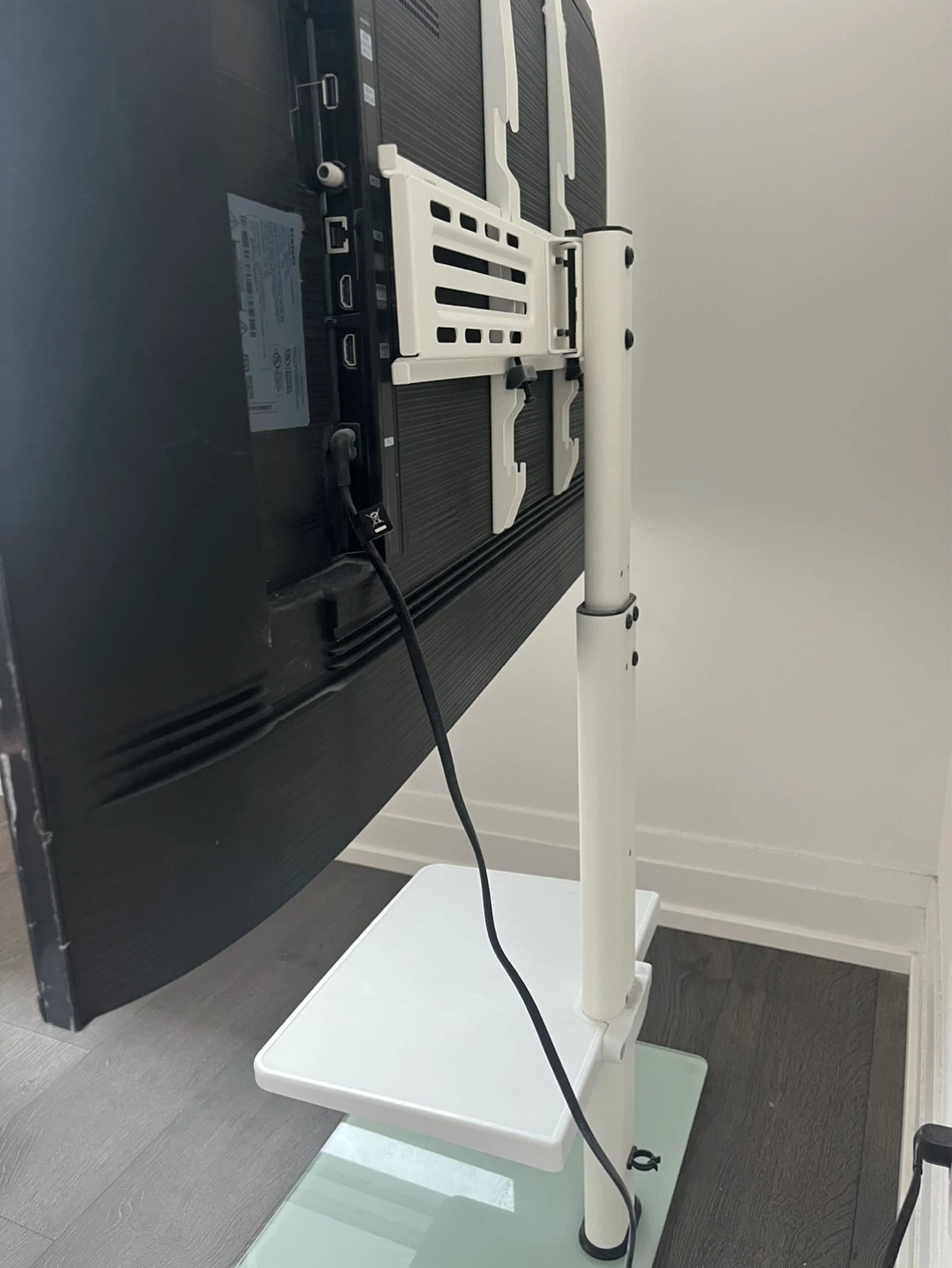Samsung 50-inch Smart TV and a TV stand. - photo 4