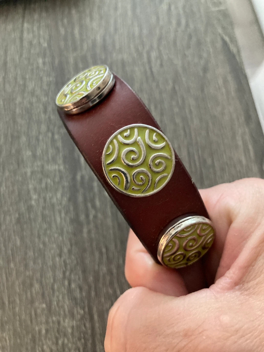 Brown Leather Cuff Bracelet with Green Swirl Design