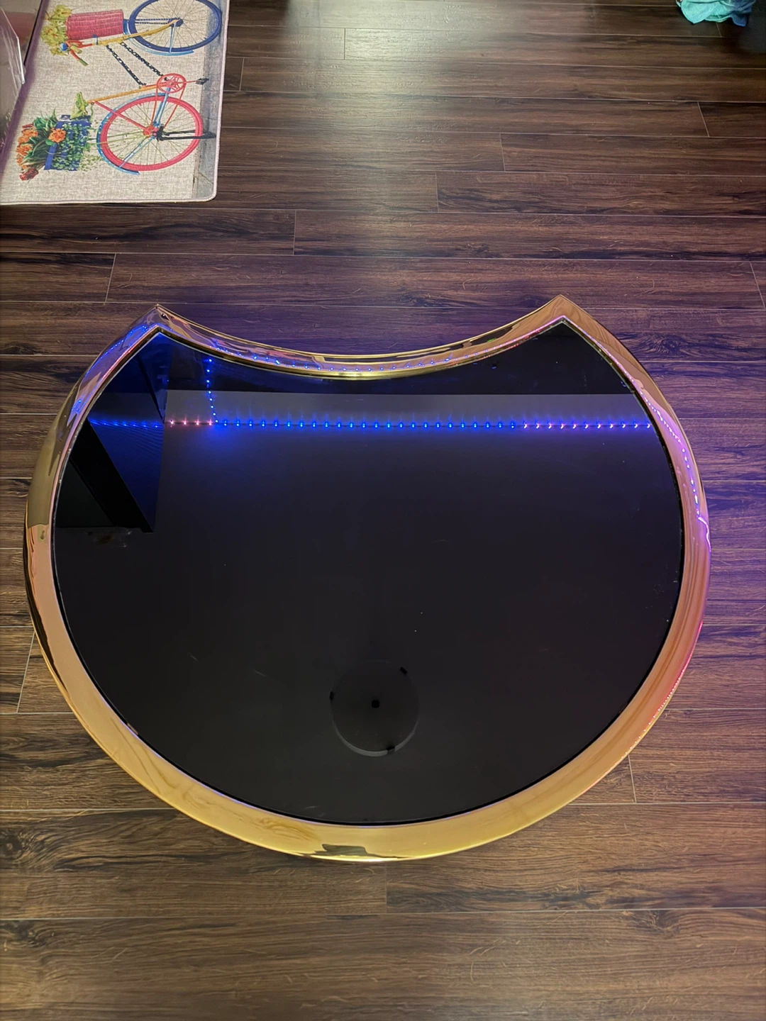 Modern Crescent Coffee Table with Black Glass Top and Gold Trim