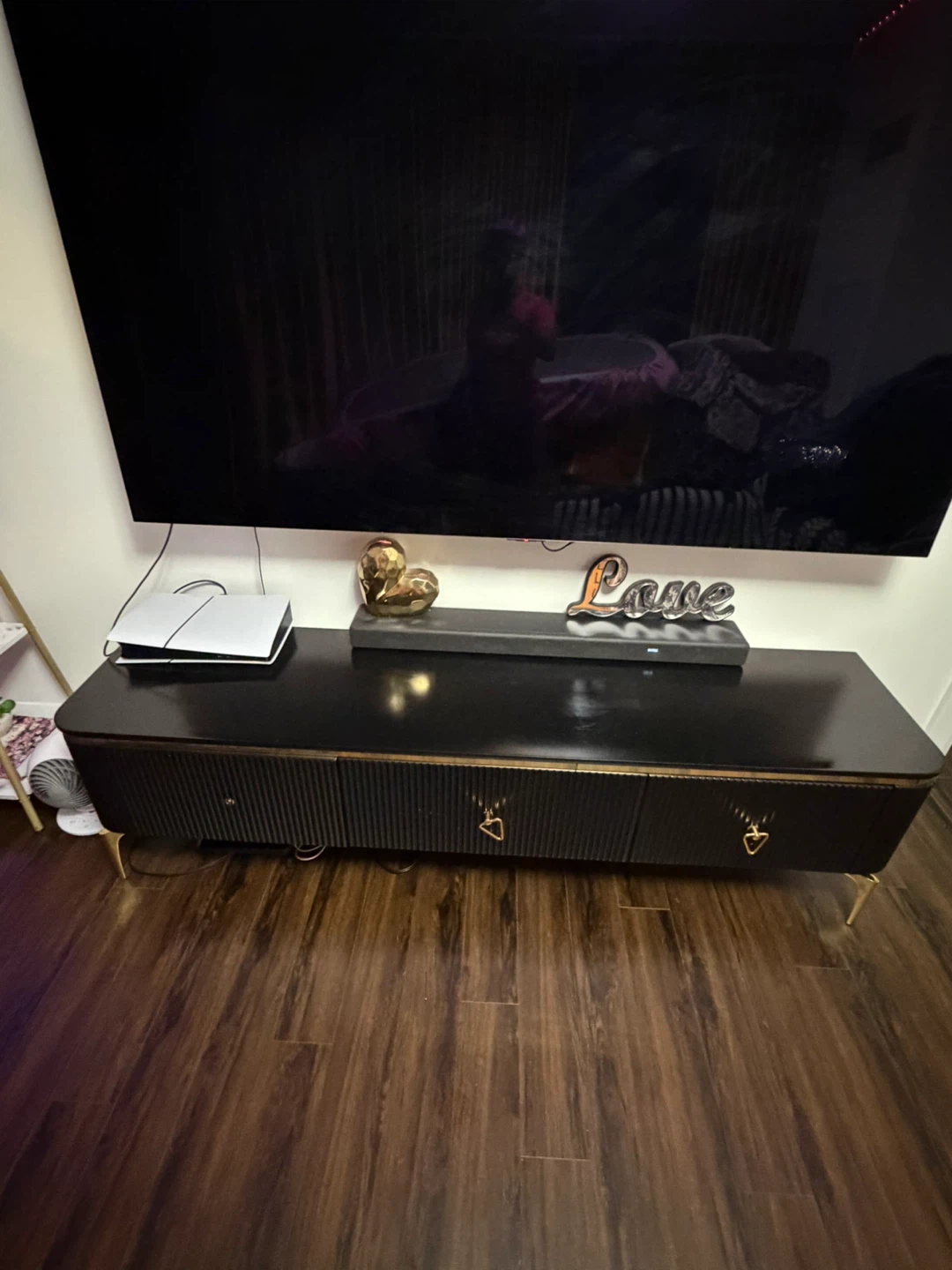 Black Media Console with Gold Accents