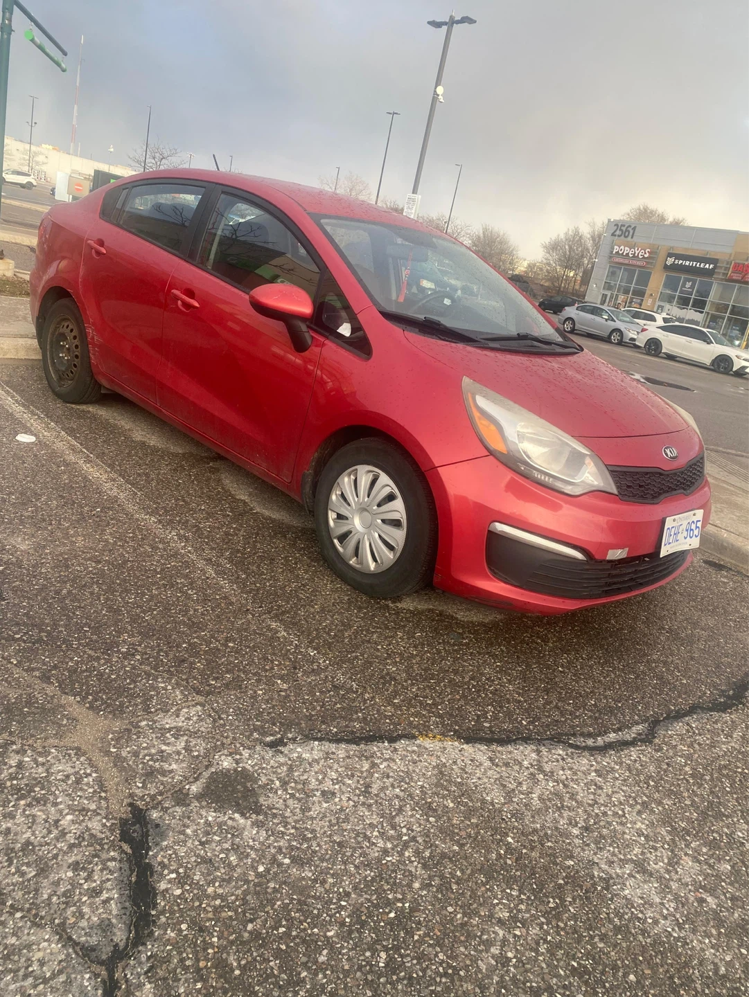 Red Kia Rio Sedan
