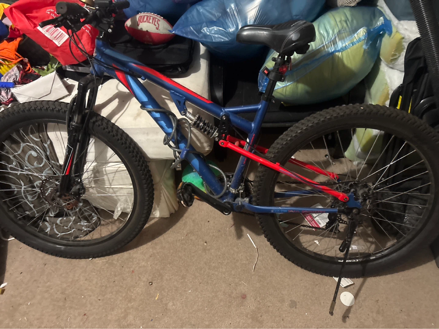 Blue and Red Full Suspension Mountain Bike