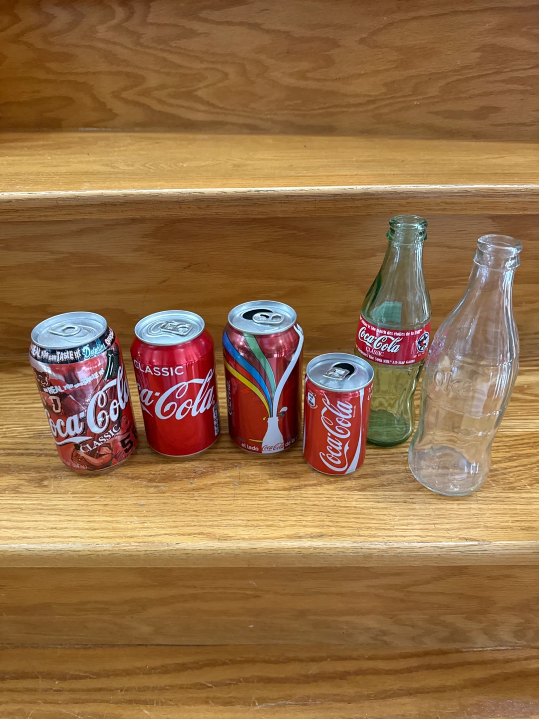 Coca-Cola assorted collectible Cans and Bottles