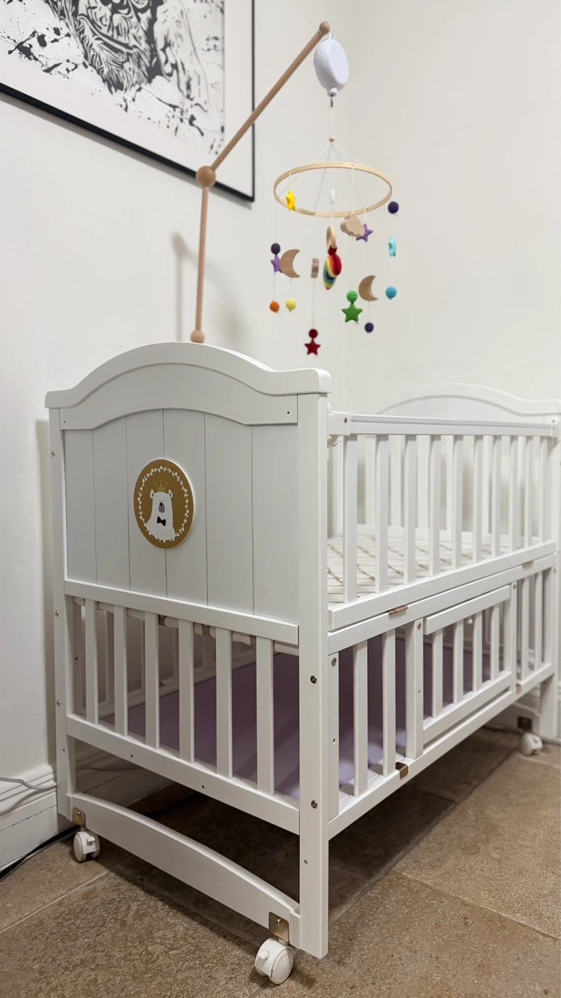 White Baby Crib with Mobile - photo 2