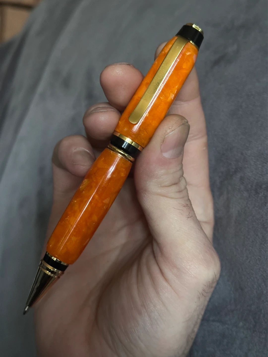 This Orange acrylic twist refillable pen