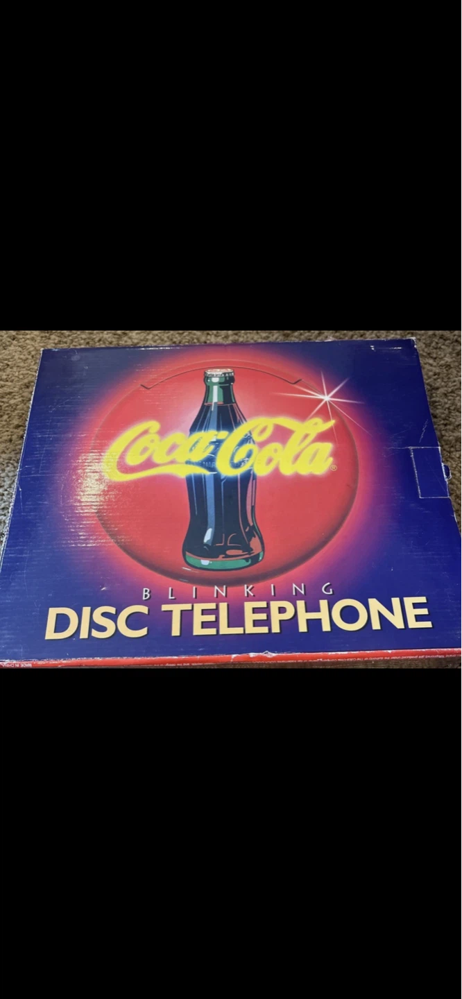 🌱 Coca-Cola Blinking Disc Telephone
