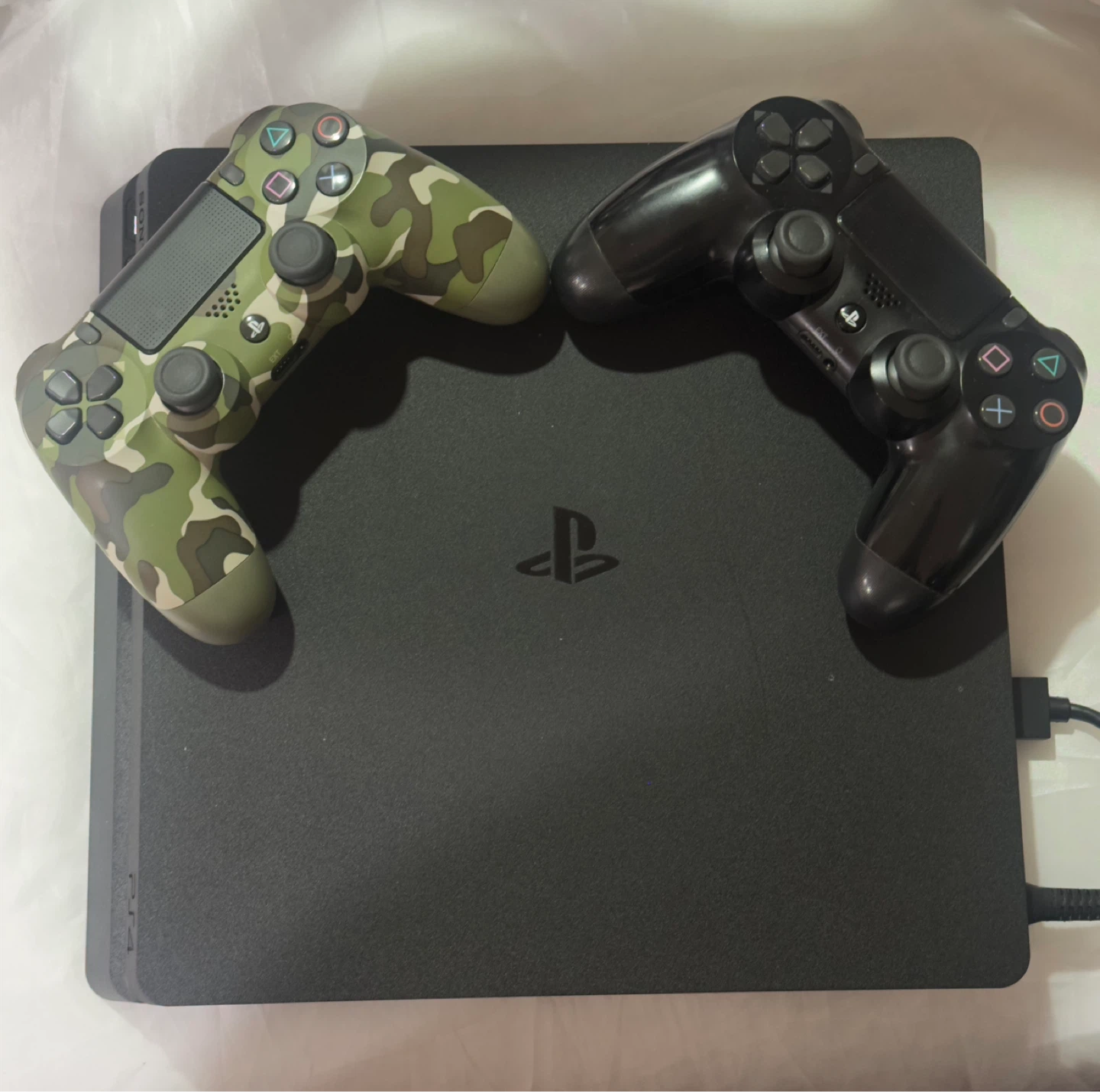 PlayStation 4 Console Bundle with Two Controllers and Games