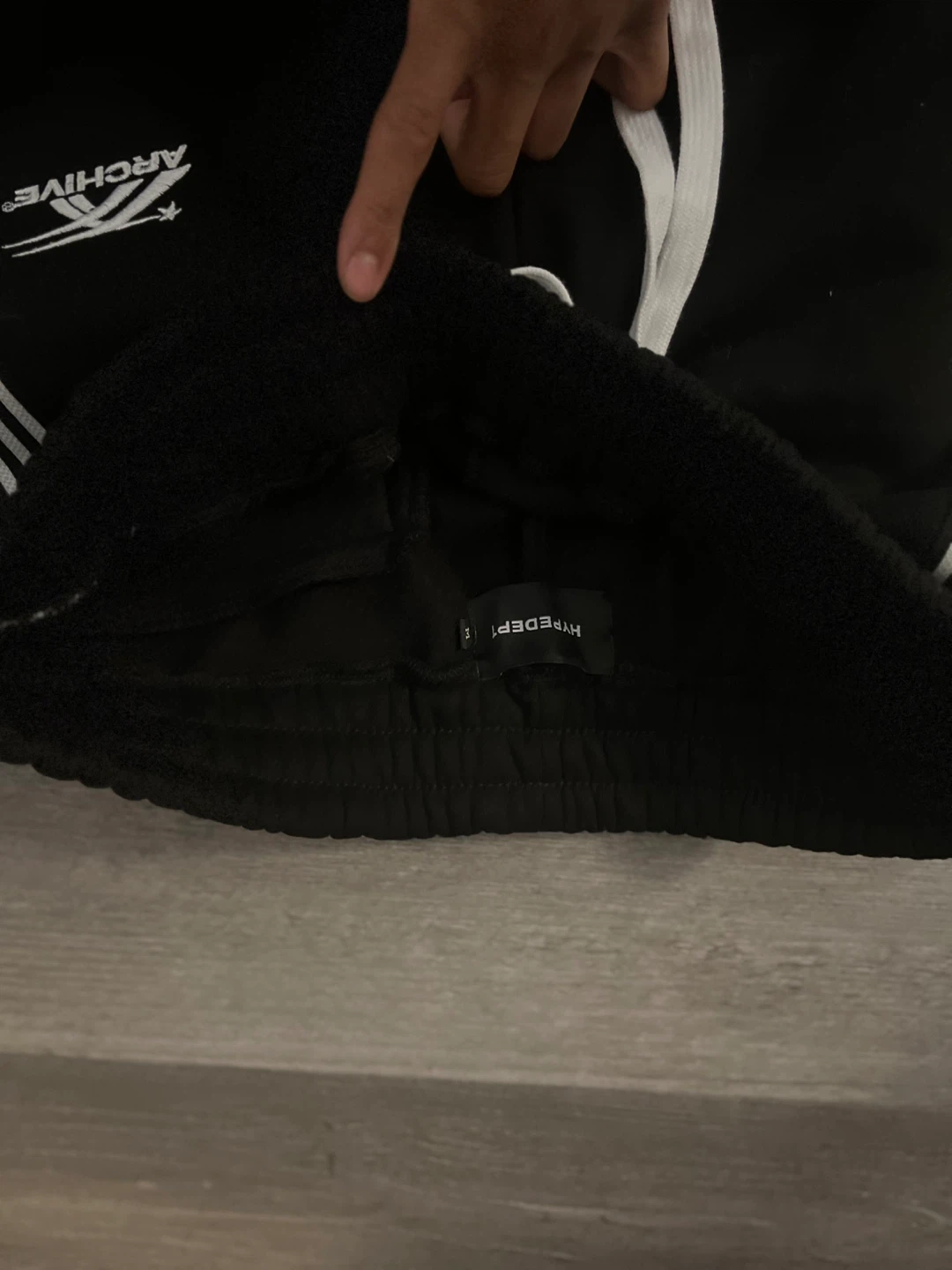 Archive black track pants with white stripe detail - photo 2