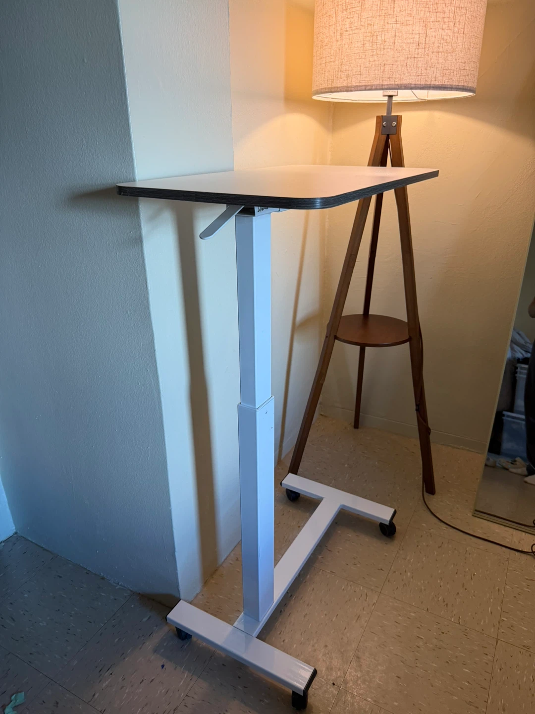 Adjustable rolling desk / laptop table in great condition.