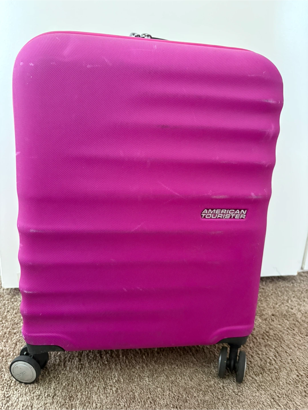 American Tourister Rolling Suitcase - Pink