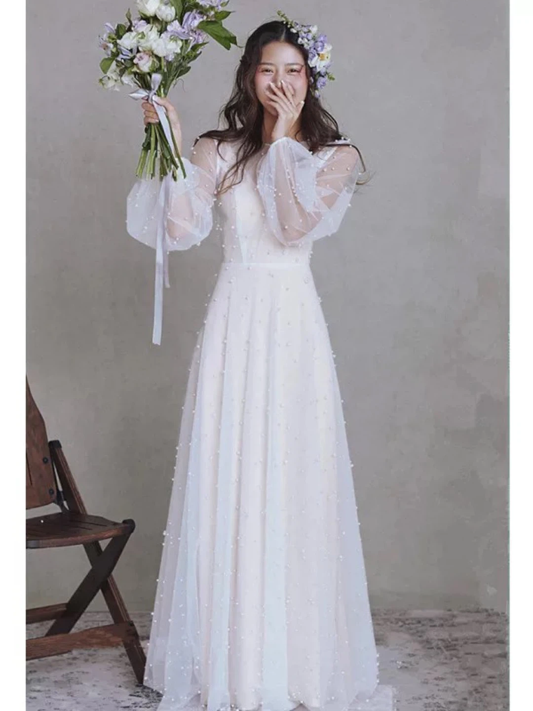 White Tulle Gown with Pearl Embellishments